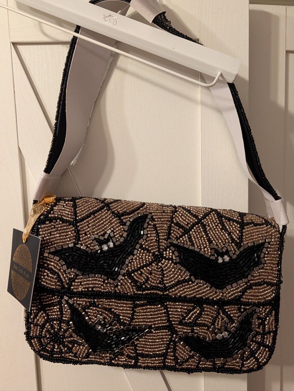 Viral Beaded Bat Motif Shoulder Bag in Black and Gold